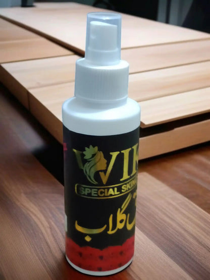 Spray bottle with Wiki Special branding on a wooden surface